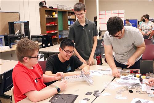 Robotics students working together